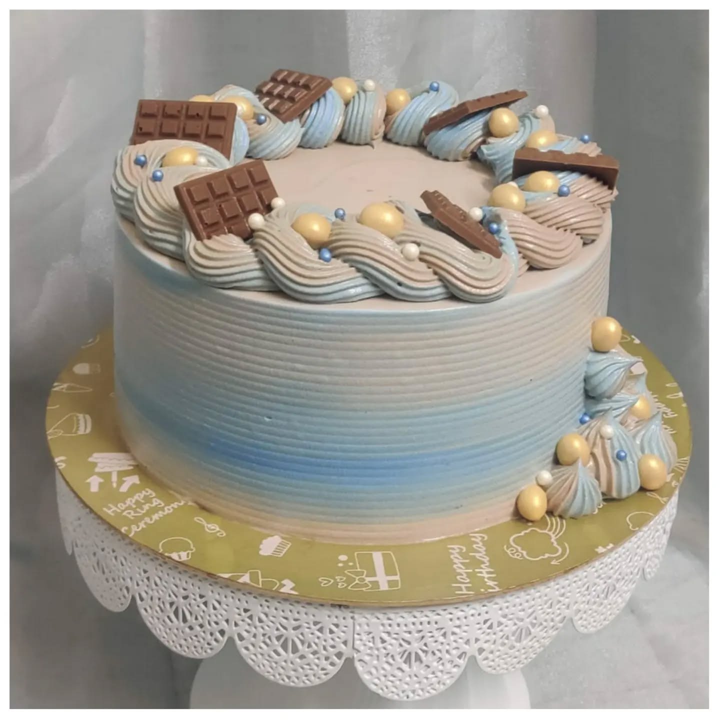 Elegant Sky-Blue and Earthy Brown Chocolate Cake