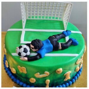A Cake for a Defender with Modelling Chocolate Figurine